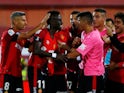 Lago Junior is mobbed by Mallorca teammates after scoring against Real Madrid on October 19, 2019