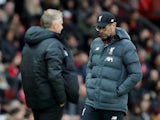 Jurgen Klopp and Ole Gunnar Solskjaer prowl their respective areas during the Premier League game between Manchester United and Liverpool on October 20, 2019