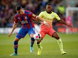 Manchester City's Raheem Sterling in action with Crystal Palace's Joel Ward on October 19, 2019