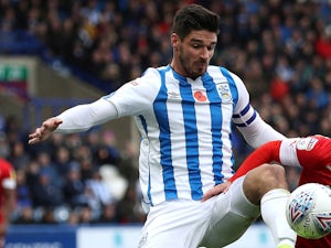 Huddersfield win Yorkshire derby to climb out of relegation places