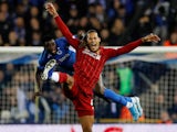 Virgil van Dijk and Paul Onuachu in action during the Champions League game between Genk and Liverpool on October 23, 2019