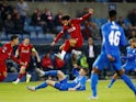 Mohamed Salah jumps over Bryan Heynen during the Champions League game between Genk and Liverpool on October 23, 2019