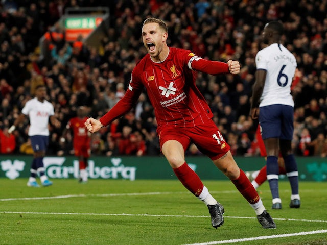 Liverpool's Jordan Henderson celebrates scoring against Tottenham Hotspur in the Premier League on October 27, 2019