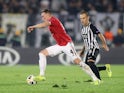 Manchester United's Phil Jones in action with Partizan Belgrade's Bibras Natcho in the Europa League on October 24, 2019