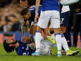 Everton's Andre Gomes reacts after sustaining an injury against Tottenham Hotspur on November 3, 2019