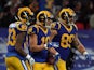 Los Angeles Rams wide receiver Cooper Kupp (18) celebrates with tight end Tyler Higbee (89) and receiver Josh Reynolds (83) after scoring on a 65-yard touchdown reception in the second quarter against the Cincinnati Bengals during an NFL International Ser