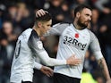 Derby County's Tom Lawrence celebrates scoring their first goal with Scott Malone on November 2, 2019