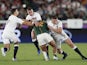 outh Africa's Damian de Allende in action with England's Owen Farrell, George Ford and Ben Youngs on November 2, 2019