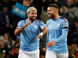 Manchester City's Sergio Aguero celebrates scoring their third goal with Nicolas Otamendi on October 29, 2019