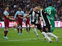 Newcastle United's Federico Fernandez celebrates scoring their second goal with Miguel Almiron on November 2, 2019