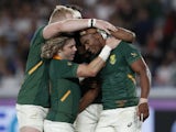 South Africa's Makazole Mapimpi celebrates scoring their first try with teammates on November 2, 2019