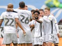 Swansea City's Nathan Dyer celebrates scoring their first goal with teammates