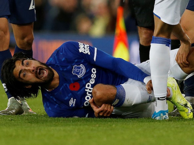 Everton's Andre Gomes reacts after sustaining an injury on November 3, 2019