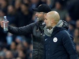 Manchester City manager Pep Guardiola and Liverpool manager Juergen Klopp talk to each other during the match in January 2019