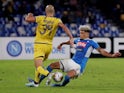 Hellas Verona's Sofyan Amrabat in action with Napoli's Kevin Malcuit in Serie A on October 19, 2019
