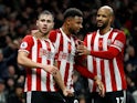 Sheffield United's George Baldock celebrates scoring their first goal with Lys Mousset and David McGoldrick on November 9, 2019
