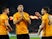 Wolverhampton Wanderers' Raul Jimenez celebrates scoring their first goal with Ruben Neves and Ruben Vinagre on November 7, 2019