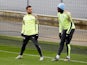 Manchester City's Bernardo Silva and Benjamin Mendy during training in November 2019