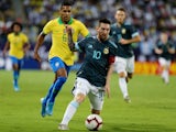 Argentina's Lionel Messi in action with Brazil's Alex Sandro on November 15, 2019