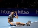Austria's Dominic Thiem celebrates after winning his group stage match against Serbia's Novak Djokovic on November 12, 2019
