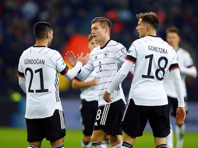Germany's Toni Kroos celebrates scoring their third goal with team mates on November 16, 2019