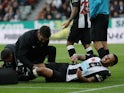 Newcastle United captain Jamaal Lascelles goes down injured against Bournemouth in November 2019