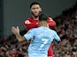 Liverpool's Joe Gomez and Manchester City's Raheem Sterling clash on November 10, 2019