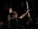 Switzerland's Roger Federer celebrates winning his group stage match against Italy's Matteo Berrettini on November 12, 2019