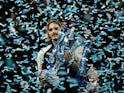 Greece's Stefanos Tsitsipas celebrates winning the ATP Finals with the trophy on November 17, 2019