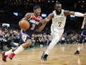 Washington Wizards guard Bradley Beal (3) drives against Boston Celtics guard Jaylen Brown (7) during the first half at TD Garden on November 14, 2019