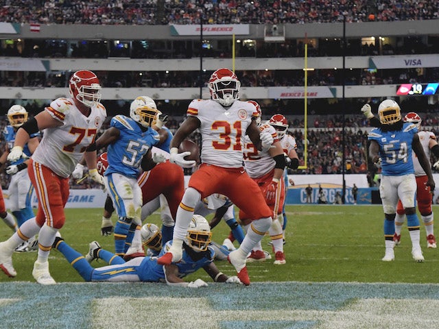 Kansas City Chiefs running back Darrel Williams (31) celebrates after scoring on a 6-yard touchdown run in the third quarter against the Los Angeles Chargers during an NFL International Series game at Estadio Azteca on November 19, 2019