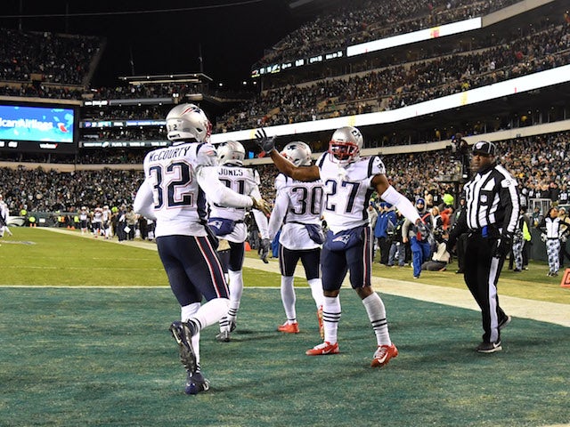 New England Patriots free safety Devin McCourty (32) and cornerback J.C. Jackson (27) celebrate in the end zone during the fourth quarter against the Philadelphia Eagles at Lincoln Financial Field on November 16, 2019