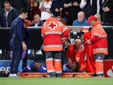 Chelsea's Tammy Abraham receives medical attention after sustaining an injury against Valencia on November 27, 2019