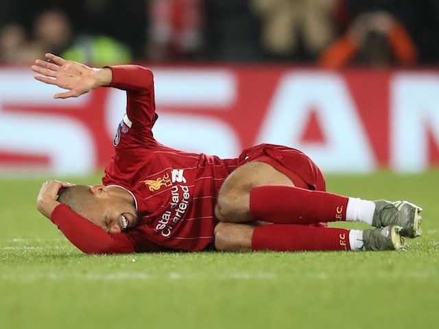 Liverpool's Fabinho reacts after sustaining an injury on November 27, 2019