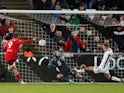 Fulham's Aleksandar Mitrovic scores their second goal against Swansea on November 29, 2019