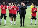 Manchester United manager Ole Gunnar Solskjaer and players applaud fans after the match on November 28, 2019