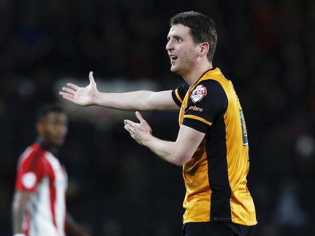 Former Hull and Ipswich defender Alex Bruce retires at 36