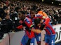 Crystal Palace's Jeffrey Schlupp celebrates scoring their first goal with Wilfried Zaha and Luka Milivojevic on December 3, 2019