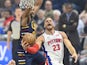 Detroit Pistons forward Blake Griffin (23) drives to the basket against Cleveland Cavaliers center Tristan Thompson (13) in the first quarter at Rocket Mortgage FieldHouse on December 4, 2019