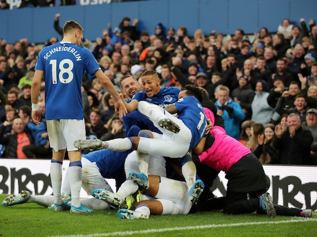 Everton's Dominic Calvert-Lewin celebrates scoring their second goal with teammates on December 7, 2019