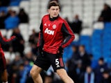 Harry Maguire warms up for Manchester United on December 7, 2019