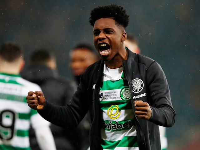 Celtic's Jeremie Frimpong celebrates winning the Scottish League Cup after the match on December 8, 2019