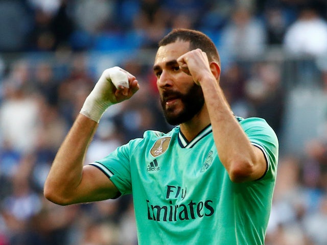 Ten-man Real Madrid beat Espanyol to move clear of Barcelona
