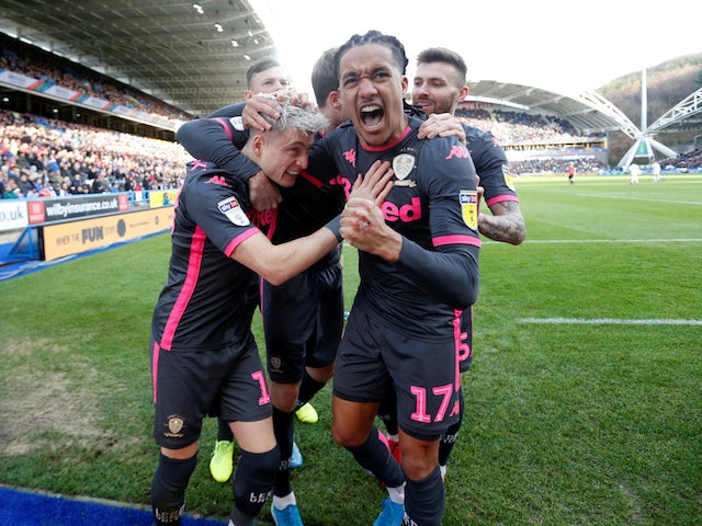 Leeds United's Ezgjan Alioski celebrates scoring their first goal with teammates on December 7, 2019