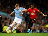 Kevin De Bruyne and 'Fred' in action during the Premier League game between Manchester City and Manchester United on December 7, 2019
