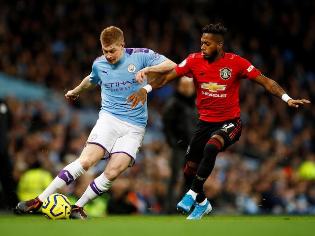 Kevin De Bruyne and 'Fred' in action during the Premier League game between Manchester City and Manchester United on December 7, 2019