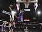 San Antonio Spurs forward Rudy Gay (22) dunks over Sacramento Kings forward Richaun Holmes (22) in the first half at the AT&T Center on December 7, 2019