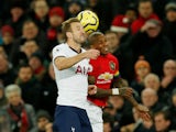 Manchester United's Ashley Young in action with Tottenham Hotspur's Harry Kane in the Premier League on December 4, 2019