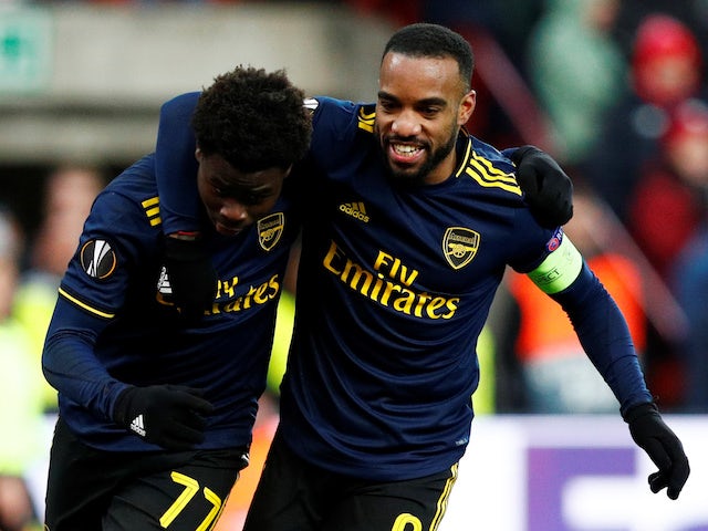 Arsenal come from two down to rescue top spot in Europa League group