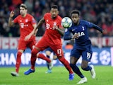 Bayern Munich defender Jerome Boateng in action with Tottenham Hotspur's Ryan Sessegnon in the Champions League on December 11, 2019